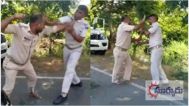 లంచం కోసం నడిరోడ్డుపై పిచ్చి.. పిచ్చిగా  కొట్టుకున్న పోలీసులు.!పోలీసులే ఇలా కొట్టుకుంటే ఎలా..? (వీడియో చుడండి)